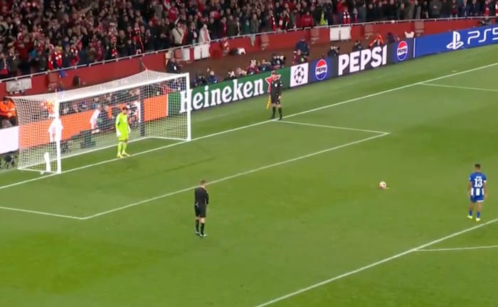 A picture captured moments before Arsenal goalkeeper David Raya (left) saved a penalty kick from Porto's Galeno (right) during a UEFA Champions League shootout in March 2024